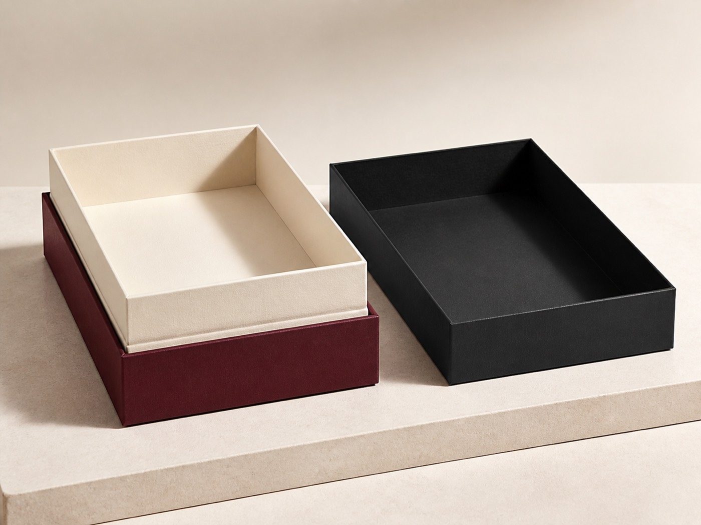 Open claret shoulder-neck box with an ivory raised collar and separate ink-black lid